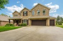 Welcome to 1661 S Coopers Cove in Fayetteville. This 5 bed, 3.5 for sale in Fayetteville Arkansas Washington County County on GolfHomes.com