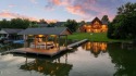 This Luxury Upscale Custom Lakefront Log  Stone Home invites you for sale in Loudon Tennessee Monroe County County on GolfHomes.com