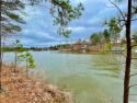 Two adjoining lake lots with over 275' of feet of combined for sale in Hot Springs Village Arkansas Saline County County on GolfHomes.com