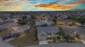 ASSUMABLE VA LOAN at 2.65% - Super rare floor plan offering 3 BR for sale in Port Charlotte Florida Charlotte County County on GolfHomes.com