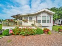 Welcome to this charming seasonal cottage in the beautiful Lake for sale in South Hero Vermont Grand Isle County County on GolfHomes.com