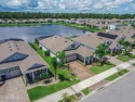 Come fall in love with this beautiful pool home overlooking a for sale in New Smyrna Beach Florida Volusia County County on GolfHomes.com