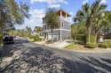 Welcome to 133 Charles Towne Lane, a beautifully designed for sale in Murrells Inlet South Carolina Horry County County on GolfHomes.com