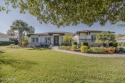 Halifax Plantation pool home situated on a large Premium Estate for sale in Ormond Beach Florida Volusia County County on GolfHomes.com