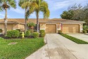 Lovely two bedroom/den, two bath Villa with one car garage for sale in Estero Florida Lee County County on GolfHomes.com