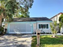Welcome to Beacon Woods where this home is located in Hitching for sale in Hudson Florida Pasco County County on GolfHomes.com