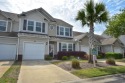 Highly sought-after Saratoga model with first floor master for sale in North Myrtle Beach South Carolina Horry County County on GolfHomes.com