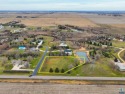 Discover the epitome of coveted living in this 1.75 acre parcel for sale in Harrisburg South Dakota Lincoln County County on GolfHomes.com