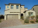 This impressive two-story home is nestled in the prestigious for sale in Las Vegas Nevada Clark County County on GolfHomes.com