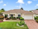 Experience the best of Florida living in this beautifully for sale in Boynton Beach Florida Palm Beach County County on GolfHomes.com