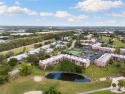 Wake up to serene lake and golf course views from this furnished for sale in Naples Florida Collier County County on GolfHomes.com