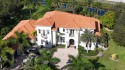 Experience unparalleled luxury in this 6,823-sq-ft under air for sale in Wellington Florida Palm Beach County County on GolfHomes.com