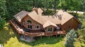 This home reflects a deep appreciation for quality and comfort for sale in Bellaire Michigan Antrim County County on GolfHomes.com