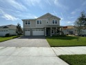 BRAND NEW!  Two-story home, the Heron Elevation B model, located for sale in Daytona Beach Florida Volusia County County on GolfHomes.com