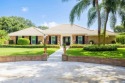 Spacious 3 bed, 3 full bath estate style home with a large for sale in Jupiter Florida Martin County County on GolfHomes.com