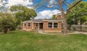 OUTSTANDING BRICK MODERN HOME UPDATED SITTING ON AN OVERSIZED for sale in Dallas Texas Dallas County County on GolfHomes.com