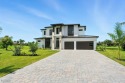 A Modern Masterpiece in Cape Royal Golf Club. Brand-new 2025 for sale in Cape Coral Florida Lee County County on GolfHomes.com