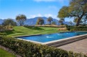 Welcome to 200 Loch Lomond, a stunning Southwest facing mountain for sale in Rancho Mirage California Riverside County County on GolfHomes.com