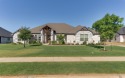 ONE-OWNER 4-3-3 SHOWCASE HOME in Pecan Plantation golfing for sale in Granbury Texas Hood County County on GolfHomes.com