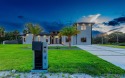 Prepare to be wowed by this magnificent 2-story home on an for sale in West Palm Beach Florida Palm Beach County County on GolfHomes.com