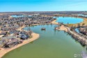 Your chance to own your waterfront dream home in the resort for sale in Windsor Colorado Weld County County on GolfHomes.com