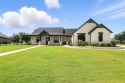 Step into this extraordinary modern farmhouse--a meticulously for sale in Granbury Texas Hood County County on GolfHomes.com