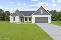 Welcome to ''The Americana'' - a brand-new construction home in for sale in Jacksonville North Carolina Onslow County County on GolfHomes.com