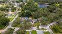 Tucked into the quiet charm of Forest Hills, 2227 S Village for sale in Tampa Florida Hillsborough County County on GolfHomes.com
