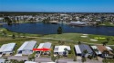 Welcome to 812 Scotia - home of the MILLION DOLLAR VIEW!  You for sale in Port Charlotte Florida Charlotte County County on GolfHomes.com