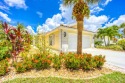 Welcome to your dream home in the prestigious gated community of for sale in Hobe Sound Florida Martin County County on GolfHomes.com