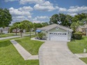 Welcome home to your single-story home with double garage on a for sale in Lake Worth Florida Palm Beach County County on GolfHomes.com