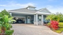 This exquisite pool home is ideally located on a lush golf for sale in New Smyrna Beach Florida Volusia County County on GolfHomes.com