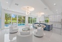 Welcome to this spectacularly reimagined residence in the for sale in Jupiter Florida Palm Beach County County on GolfHomes.com