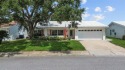 Welcome to your dream home! This beautifully updated 2-bedroom for sale in Pinellas Park Florida Pinellas County County on GolfHomes.com