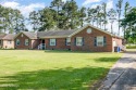Large brick ranch in the heart of Elizabeth City with golf for sale in Elizabeth City North Carolina Pasquotank County County on GolfHomes.com