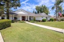 Golf course views, cul-de-sac charm, and gorgeous appeal inside for sale in Bakersfield California Kern County County on GolfHomes.com