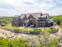 Step into the extraordinary at 8225 Scotscraig Ct, a masterfully for sale in Cleburne Texas Johnson County County on GolfHomes.com