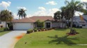 Imagine having your morning coffee on your oversized lanai for sale in Rotonda West Florida Charlotte County County on GolfHomes.com