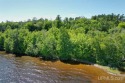 Portage Lake Waterfront Property - Buildable Lot! A parcel for sale in Houghton Michigan Houghton County County on GolfHomes.com