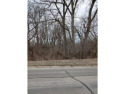 A lot of trees!! Try to find 1.82 acre lot in the middle of town for sale in Albert Lea Minnesota Freeborn County County on GolfHomes.com