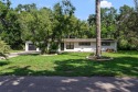 Experience serene, resort-style living in this stunning estate for sale in Tampa Florida Hillsborough County County on GolfHomes.com