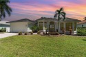 Welcome to your waterfront paradise in the coveted Peninsula for sale in Cape Coral Florida Lee County County on GolfHomes.com
