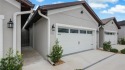 One or more photo(s) has been virtually staged. Step into a for sale in Groveland Florida Lake County County on GolfHomes.com