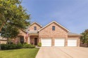 Tucked into a peaceful interior lot in Woodbridge, this home is for sale in Sachse Texas Collin County County on GolfHomes.com