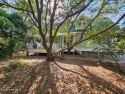 Overlooking the 4th fairway of the BHI Club, this charming for sale in Bald Head Island North Carolina Brunswick County County on GolfHomes.com