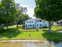 Hard to find 120ft of sandy private frontage on highly desirable, Michigan