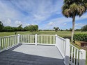 The VIEW. It's all about the View. This home needs some TLC, but for sale in Hobe Sound Florida Martin County County on GolfHomes.com