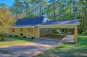 This 2 story beauty backs up to the national forest and is a for sale in Hemphill Texas Sabine County County on GolfHomes.com