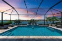Relax, escape, and unwind in this almost new, lakefront pool for sale in Nokomis Florida Sarasota County County on GolfHomes.com
