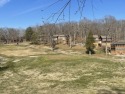 Attention golf lovers! This luxurious, expanded home overlooks for sale in Bronston Kentucky Pulaski County County on GolfHomes.com